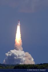 15 seconds into the launch of STS-115, headed out/up over... by Patrick Reardon 